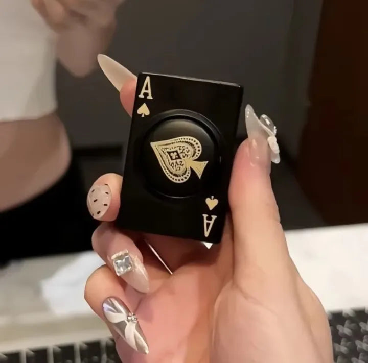 View of the card-shaped lighter highlighting the spinner mechanism