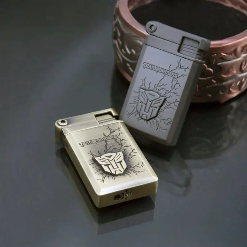 Front view of the Autobot jet flame lighter with detailed engravings