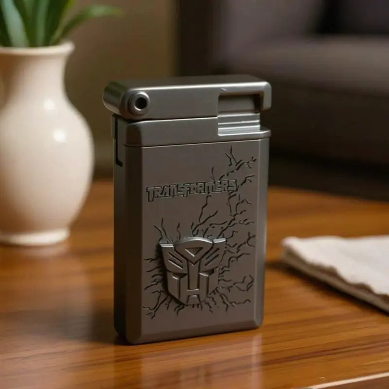 Transformers Autobot Metal Lighter standing upright on a surface